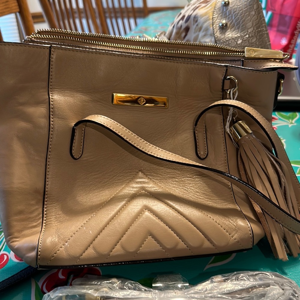 Tan Antonio Melani handbag.  Shoulder strap brand new